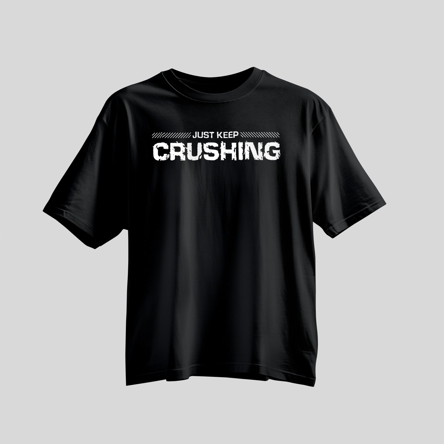 Black shirt with bold white font saying Just Keep Crushing across chest