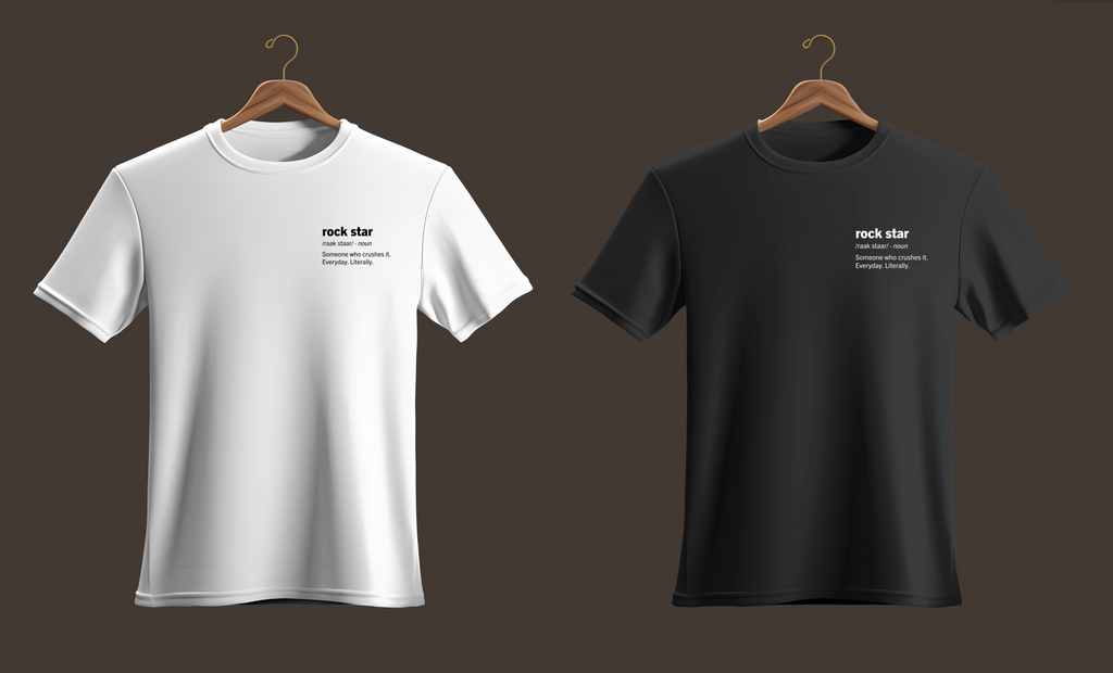 Left Shirt is Rockstar definition on left side of chest in bold black font on white shirt. Right shirt is Rockstar definition on left side of chest in bold white font on black shirt.