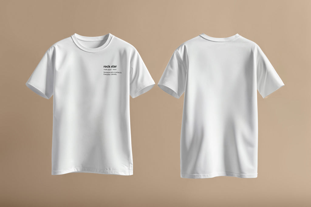 Rockstar definition on left side of chest in bold black font on white shirt.
